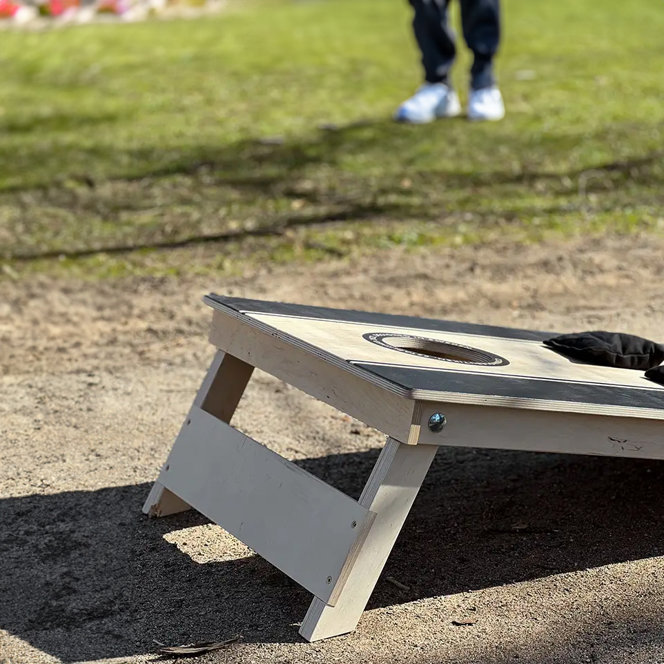 cornhole spel svart miljo